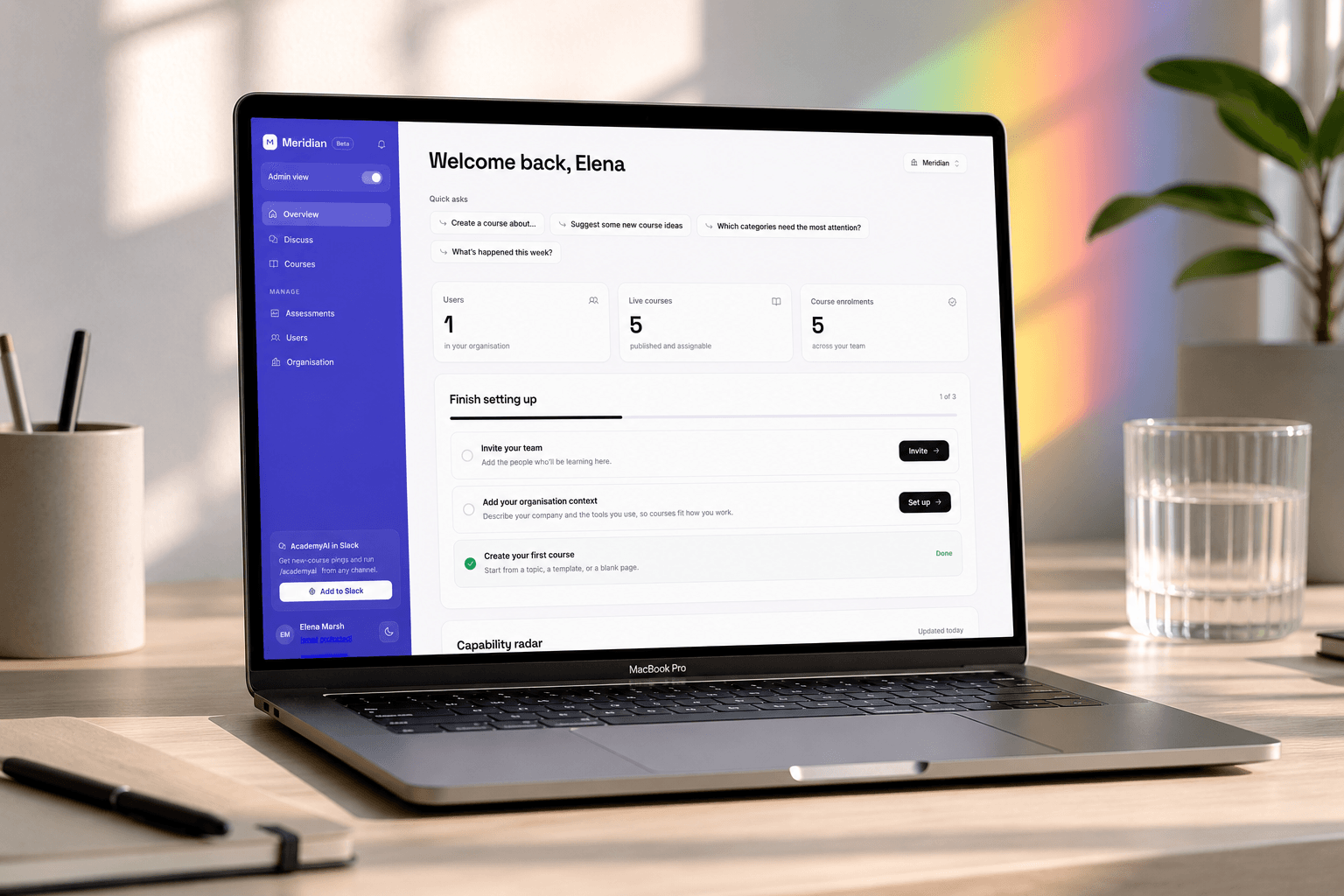 A partner-branded AcademyAI academy running on a laptop, showing an admin dashboard with capability metrics, courses and onboarding